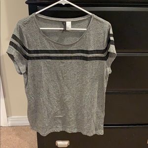 Gray tee with black mesh stripes